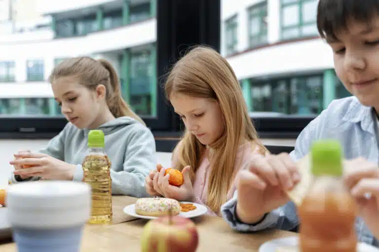 students having lunch at a dining table