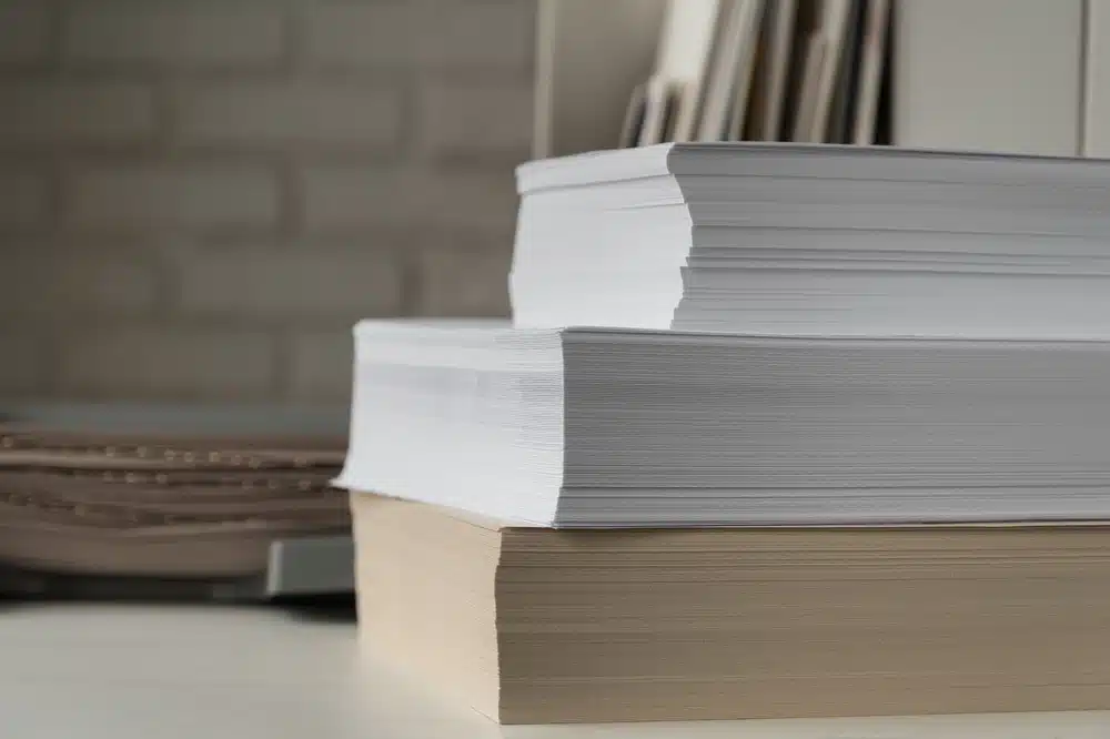 a stack of printed papers